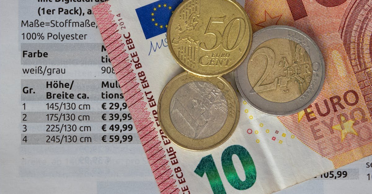 Calculator and price guide showing two different coin pricing approaches